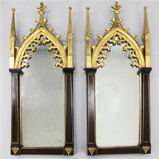 A pair of Victorian brass strung rosewood and parcel gilt wall mirrors, W.1ft 6in. H.3ft 10in.